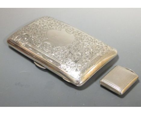 An engraved cigarette case, Chester 1900 (5.9oz) and a small silver cased travel clock (2)  