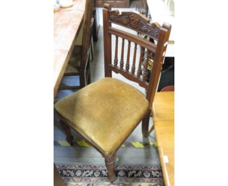 An Edwardian two tier jardiniere stand together with another, an Edwardian dining chair, a mahogany commode, a swing frame to