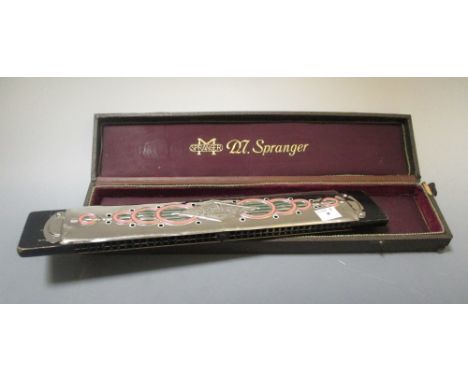 A cased chromatic harmonica by M Spranger "The Jockey"  