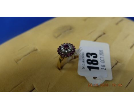 An 18ct gold Ruby and Diamond cluster ring