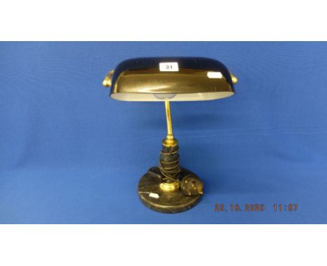 A desk lamp on marble/ granite base
