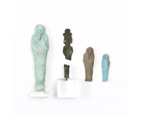 Egypt, two bleu faience Ushabti, a terracotta Ushabti and a bronze Osiris, Late Period. largest Ushabti with hieroglyphs (Osi
