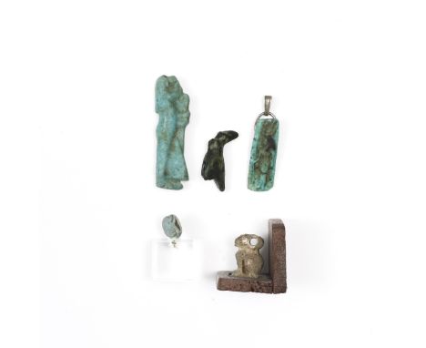 Egypte, four faience amulets and a bronze Horus, Late Period. L. 4,5 - 1 cm. Private Dutch collection, collected between 1980