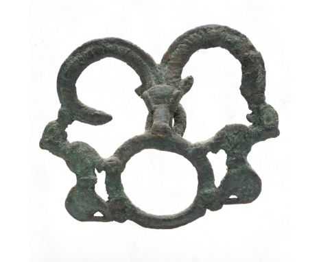 Luristan, a bronze horse bit, ca. 1st century BC. w. 9,7 cm. On perspex frame. Provenance: Galerie Lemaire, 19-01-1984, Amste
