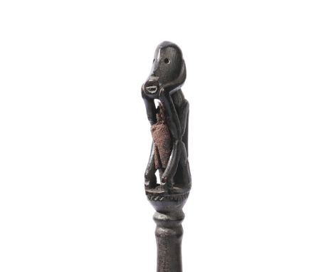 Borneo, Sarawak, Iban Dayak, pig trap stick, tun-tun, the squatting figure with hands supporting the jutting chin, a piece of