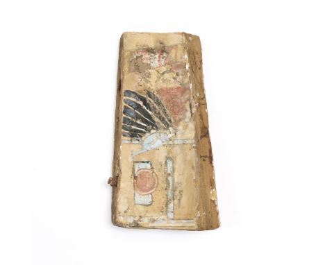 Egypt, a fragment of a sarcophagus, Ptolomeic Period. partly painted with a winged figure and geometrical patterns. L. 26 and