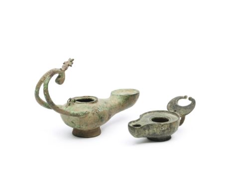 Two Greco-Roman bronze oil lamps, ca. 1st-3rd century AD; L. 15 and 9,5 cm. [2]
