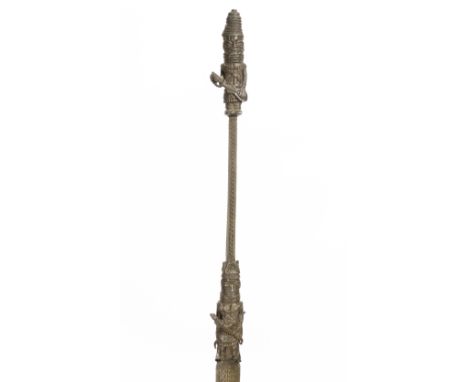 Benin Kingdom, a bronze staff decorated with a pair of Janus figures, geometrical engraved patterns and topped by a standing 