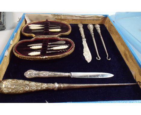 A Collection of Silver Handled Button Hooks, Manicure Set Etc