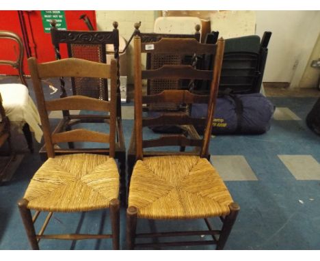 A Pair of Oak Framed Hall Chairs and Two Ladder Back Chairs