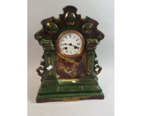 A Late Victorian Ceramic Clock Surround with Movement, 37cm high 