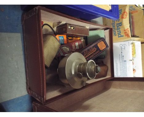 A Vintage Suitcase Containing Paraffin Lamps, Aladdin Lamp etc