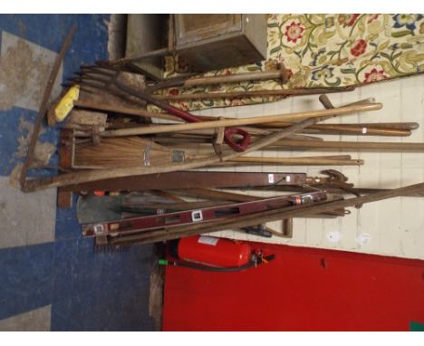A Collection of Garden Tools and Implements