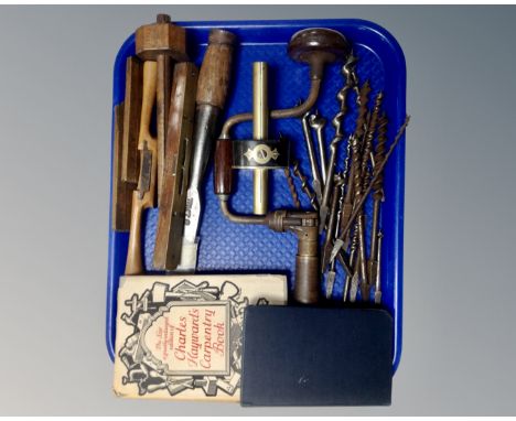 A tray of vintage wood working and hand tools, boxwood rulers, two volumes wood workers pocket book and Charles Haywoods carp