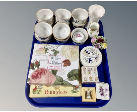 A tray of Royal Worcester ramekins and Royal horticultural society tea spoons, Bunnykins plate, thimble and china posie etc 
