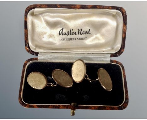 A pair of 9ct gold gent's cufflinks in Austin Reid box  CONDITION REPORT: 6.9g 