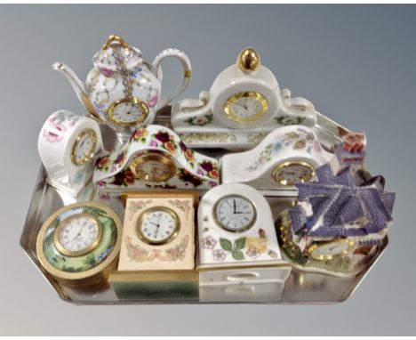 A collection of nine ceramic and china mantle clocks, Wedgwood and Aynsley etc 