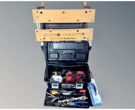 A Black and Decker workmate together with plastic tool box with lift out tray containing tools and foot pump 