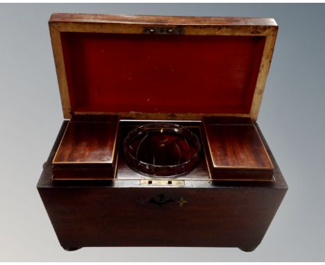 A Victorian mahogany sarcophagus tea caddy  