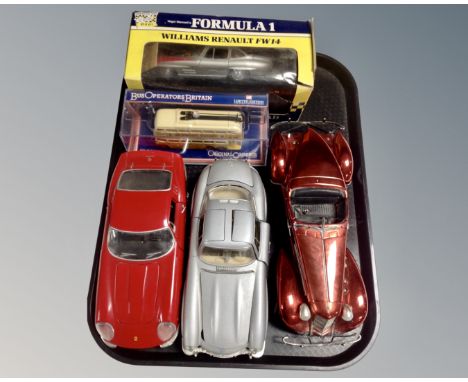 Three large die cast vehicles : Burago, etc and a Corgi Omni Bus and one further 