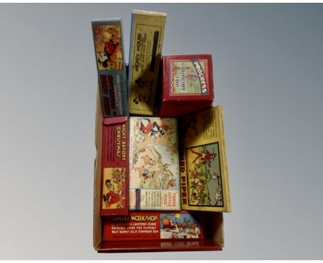 A box of vintage giroscope together with six boxed sets of vintage Disney lantern slides 
