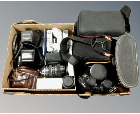 A box of cameras : Petri Ricoh Fujica lenses, camera bags and Somix Zenith 10 x 50 field glasses in case 