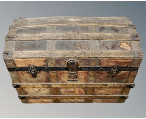 An antique bentwood shipping trunk 