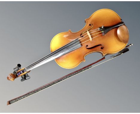 An Oskar Bernhard Heinel viola with two piece back label, 15.5" with bow
