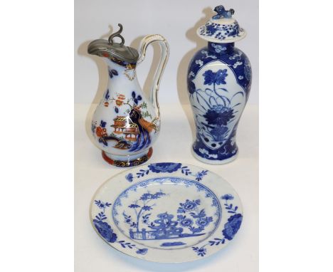 Blue and white Delftware plate with chinoiserie decoration, D22cm; C19th jug decorated with chinoiserie scenes, with pewter m