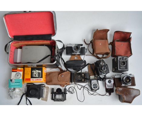 Collection of vintage camera equipment to include Kodak SIX-20 C and 44A Brownies with boxed flash holder, Polaroid 103 with 