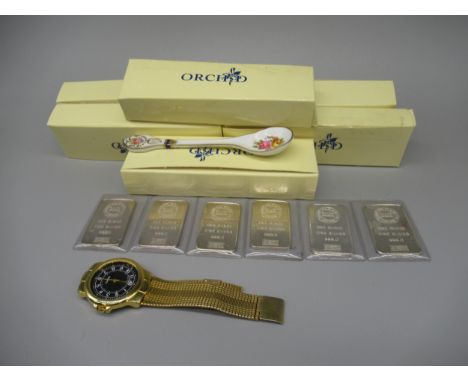 Six 999.0 fine silver one ounce ingots by Sharps Pixley and Co., a yellow metal wristwatch, and six Orchard ceramic patterned