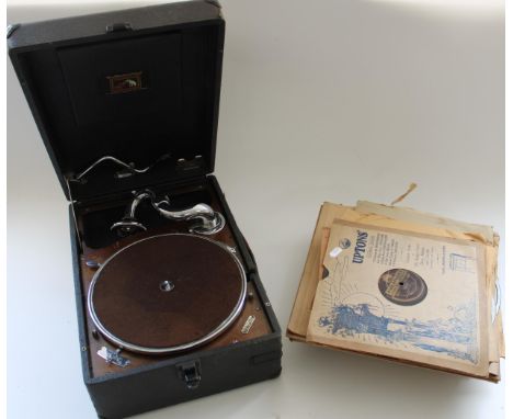 HMV table top gramophone in black carry case with a selection of records 