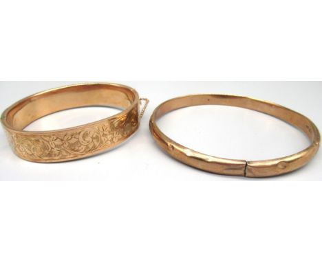 9ct yellow gold bangle with engraved leaf design, and another 9ct gold bangle, both stamped 9ct (A/F), 23.8g 