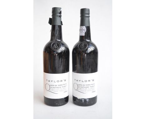 Two unopened 75cl bottles of Taylor's 1982  Quinta De Terra Feita Vintage Port, bottled 1984, with wooden crate, lid partiall