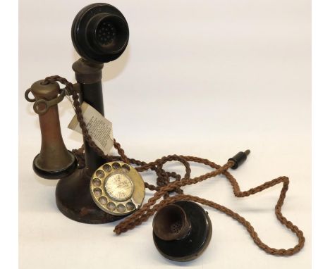 Early C20th black candlestick telephone, the metal stand stamped PX24/235 and No.150, original corded flex, H33cm and a No.1 