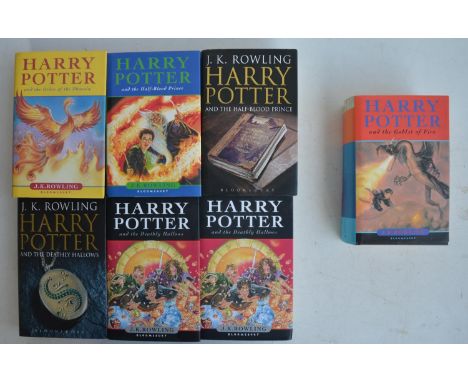 Seven hardback Harry Potter books by J K Rowling to include 6 first editions, (1 x Order Of The Phoenix, 2 x Half Blood Princ