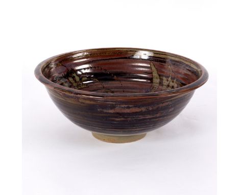 David Leach (1911-2005) for Lowerdown Pottery, a stoneware footed bowl, the interior with wax resist foliate designs in celad