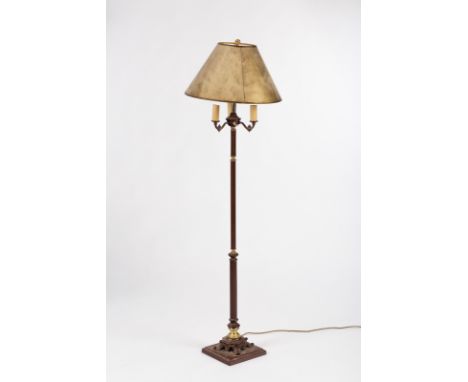 An antique style standard lamp