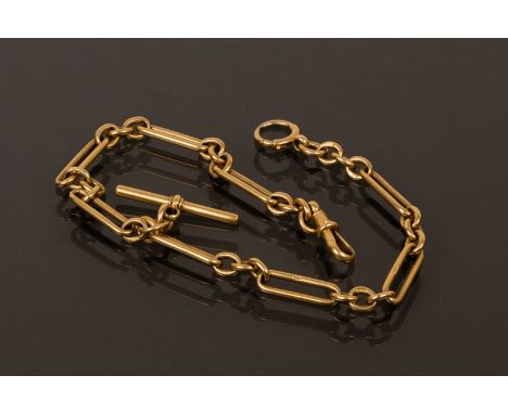 An 18ct yellow gold double Albert chain, M & M, with clip to one end and circular clip to the other, centred by a swivel bar,