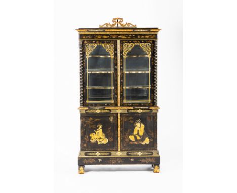 A fine Regency black and gold lacquer cabinet with pierced surmount and decorative frieze of peacocks, terrapins and foliage,