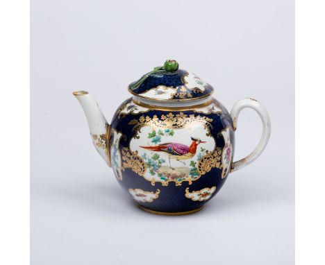 A Worcester style blue scale teapot painted exotic birds within shaped reserves, a closed bud to the cover, 14cm high Provena