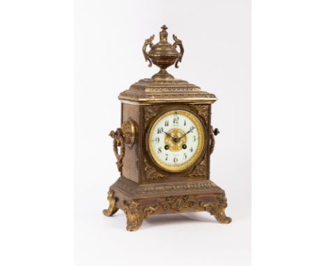 A French gilt metal mantel clock with eight-day movement, striking on a gong, 40cm high