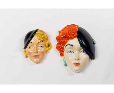 Beswick Ware, An Art Deco style wall mask, lady with orange curled hair and black beret, stamp and design number 314, 24cm hi