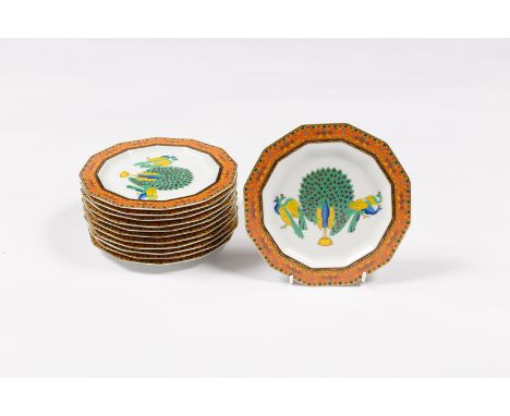 Twelve Rosenthal Versace Le Voyage de Marco Polo side plates of dodecagon shape, the centre painted peacocks within a stylise