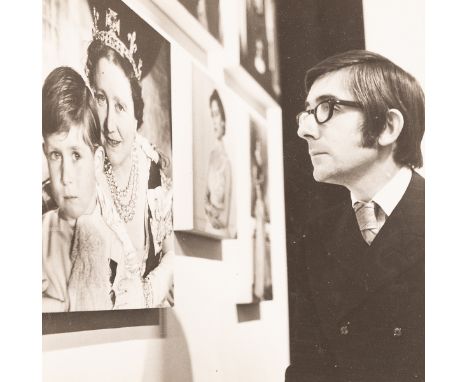 Godfrey Argent (1937-2006)/Sir Roy in the 1968 Beaton Exhibition/contemplates a photograph of the Queen Mother and Prince Cha