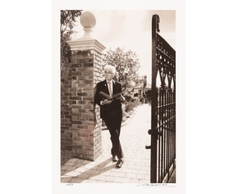 John Swannell (born 1946)/Sir Roy Strong/resting on the gate to the Colonnade Court in the Laskett gardens with a vista to th