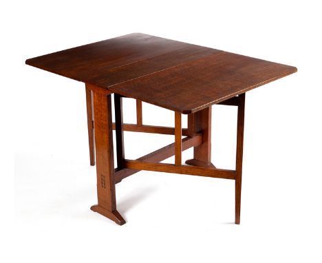 Arthur Simpson of Kendal (1857-1922)/An oak occasional table with two folding flaps and gate legs, the side supports with two