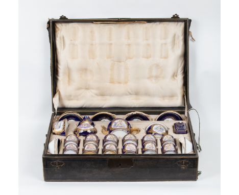 A Sèvres style cased coffee service, circa 1840, painted with cherubs at various pursuits within tooled gilt foliate borders,