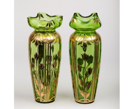 A pair of Art Nouveau style vases, the green tapered sides overlaid with copper enamel flowers and foliage, 31cm high