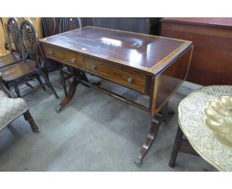 A Regency inlaid mahogany drop leaf sofa table 